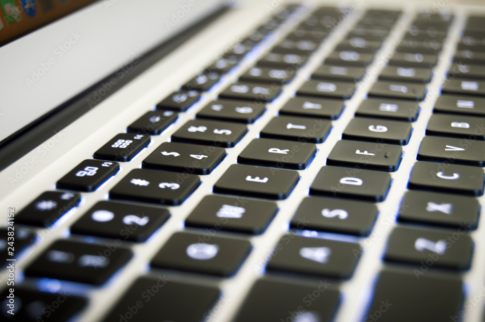 business working on laptop close up keyboard computer for business