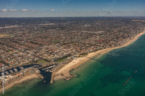 Taking Off from Adelaides International Airport with a clear blue sky showing spectacular views of the city and its coastline.