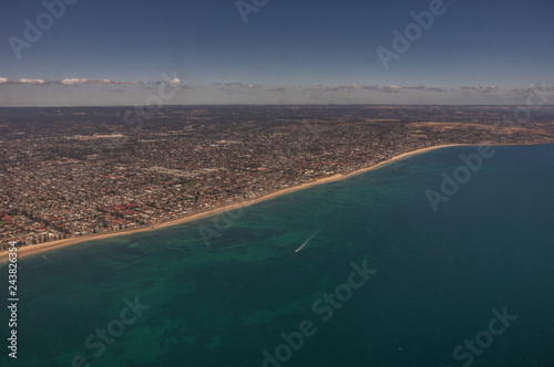 Taking Off from Adelaides International Airport with a clear blue sky showing spectacular views of the city and its coastline.