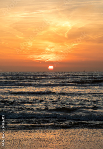 Scenic View Of Sea Against Orange Sky