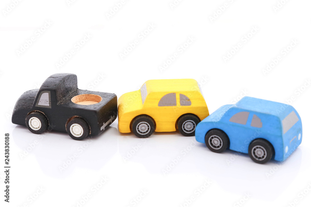 Fototapeta premium wooden car toy on white background.