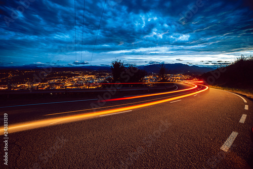 View of abstract shines on road at night photo