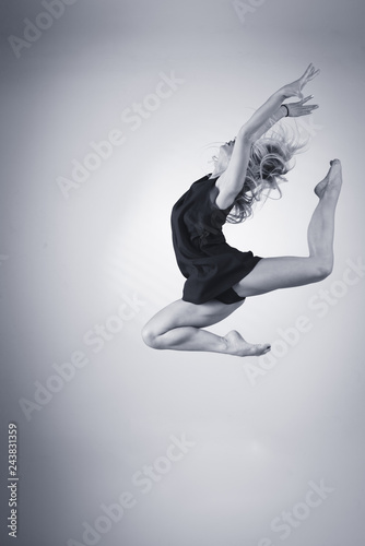 Young ballet dancer jumping high in the air. © konstantin0000