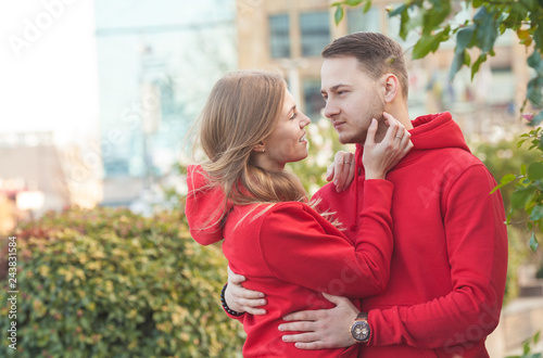 Young couple in love outdoor.Stunning sensual outdoor portrait of young stylish fashion couple. 