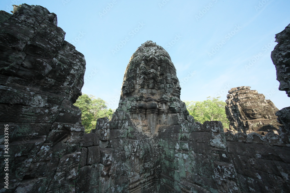 Siem Reap,Cambodia-Januay 11, 2019: Bodhisattva face towers viewed from the upper terrace of Bayon, Angkor Thom, Siem Reap