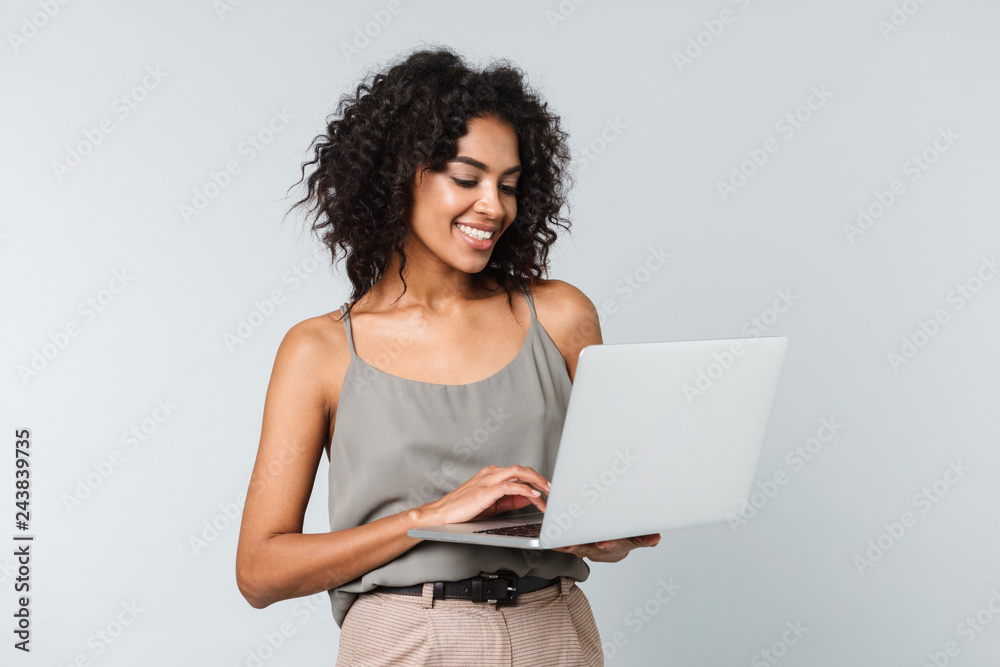 Full length of a happy young african woman Full length of a happy young african woman