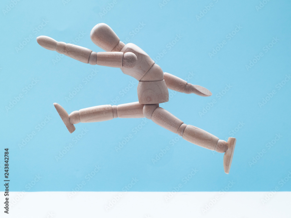 man jumping on blue sky background