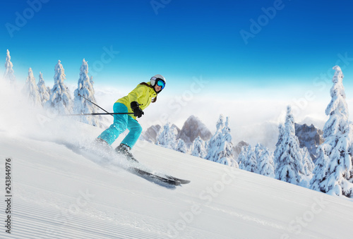 Young woman skiing in Alps