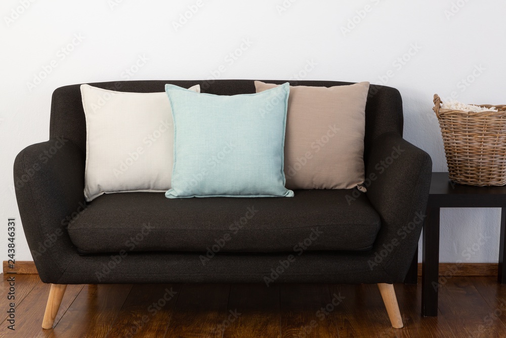 Naklejka premium Cushions arranged on sofa
