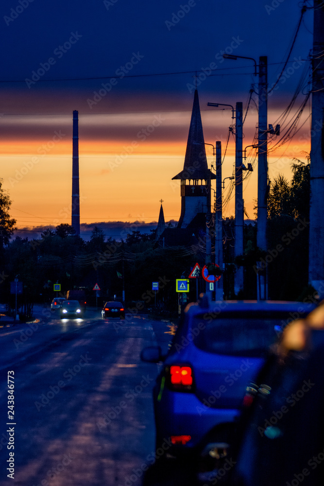 Fototapeta premium Road with cars in an idyllic light
