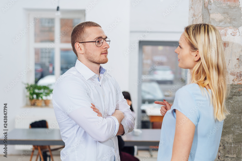 Fototapeta premium Businesswoman and man having a serious discussion