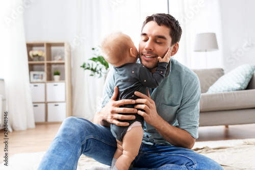 фотографія family, fatherhood and people concept - happy father with little baby daughter a