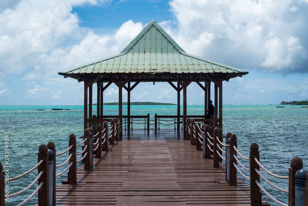 Traditional wooden pier on tropical island Traditional wooden pier on tropical island