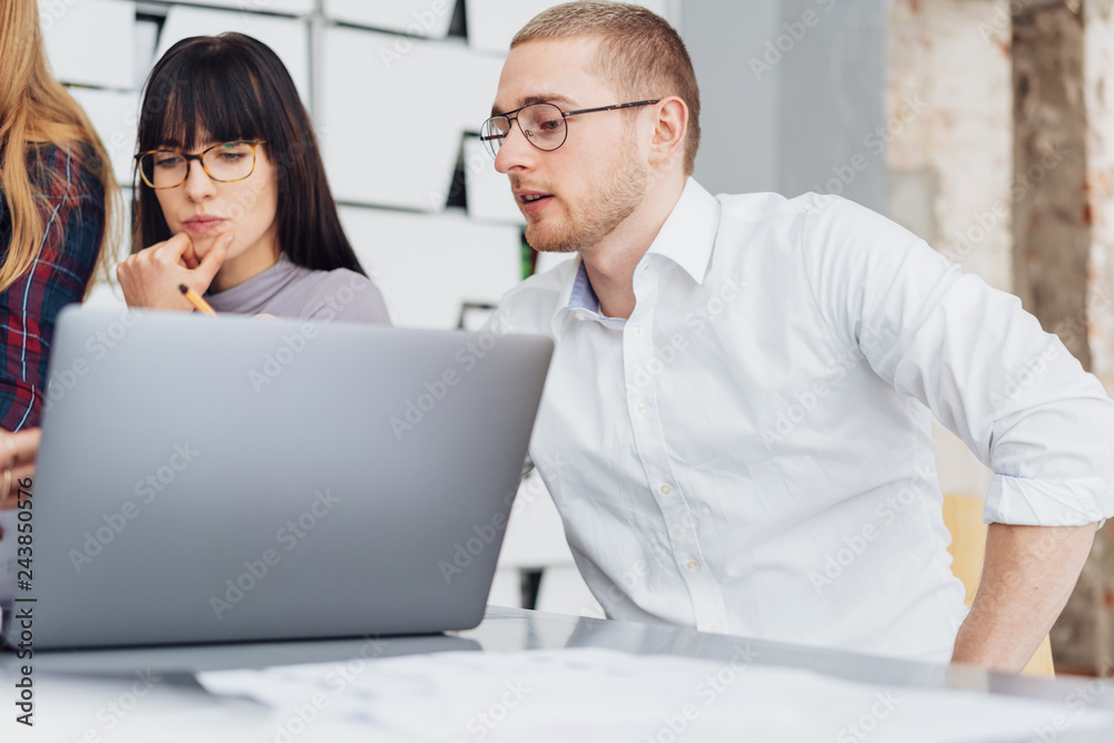Obraz premium Two young businesspeople or students