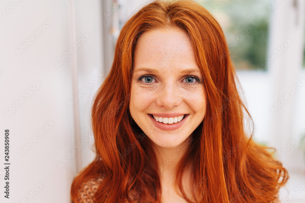 Young red-haired woman close-up portrait Young red-haired woman close-up portrait