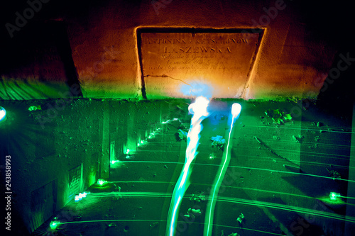 Memento mori - lights and graves on All Saints  Day in the Powazki Cemetery  Polish  Cmentarz Powazkowski  - is a historic cemetery located in the Wola district  western part of Warsaw  Poland.