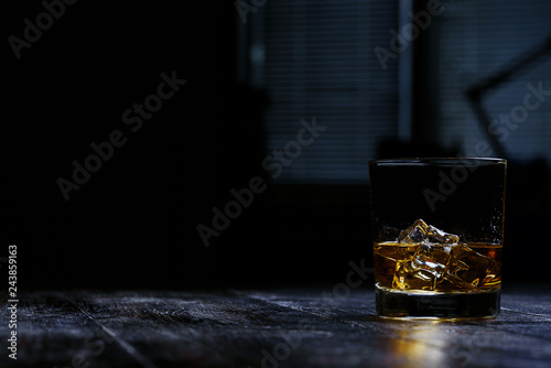 whiskey with ice in modern glasses