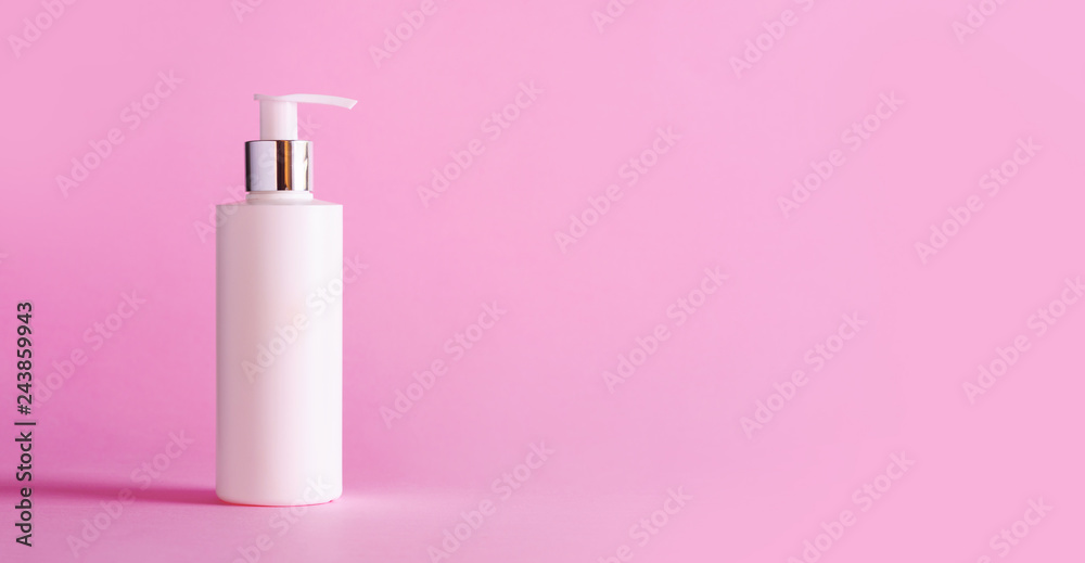 White bottle of moisturizing lotion on pink background with copy space. Minimalism style. Skin care, body treatment, beauty concept White bottle of moisturizing lotion on pink background with copy space. Minimalism style. Skin care, body treatment, beauty concept