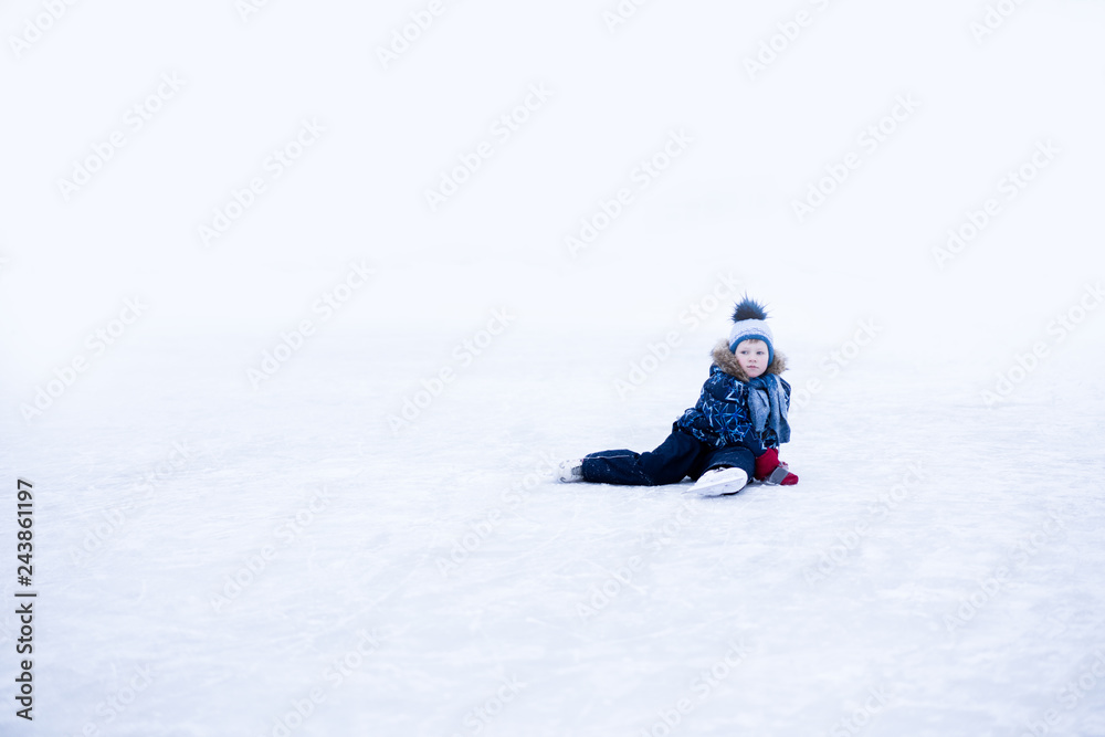 funny moment - cute little boy fell on the ice skating rink funny moment - cute little boy fell on the ice skating rink