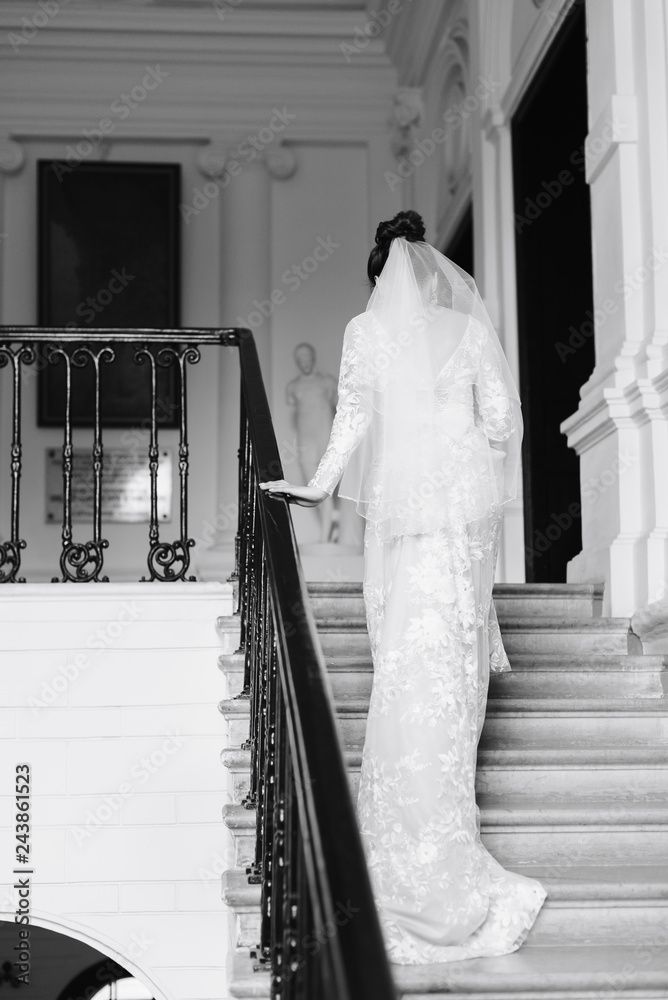 morning of the bride, a beautiful woman in a white dress is preparing for the wedding