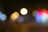 Bokeh lights in the night city. Defocused nighttime street lights.