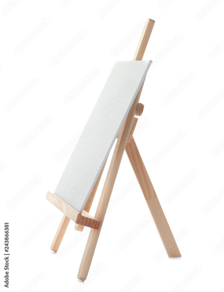 Wooden easel with blank canvas board on white background. Children's painting