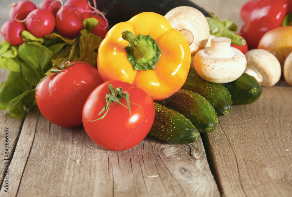 Composition with assorted raw organic vegetables wooden table Composition with assorted raw organic vegetables wooden table