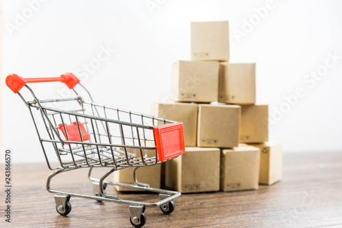 Shopping Carts with Paper Boxes Putting on Notebook Computers, Inventory Management, Warehouse