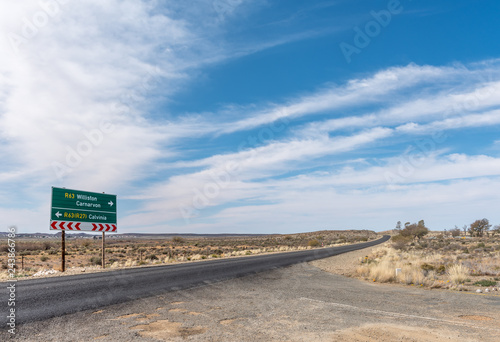 Directional road sign on road R63 near Williston photo