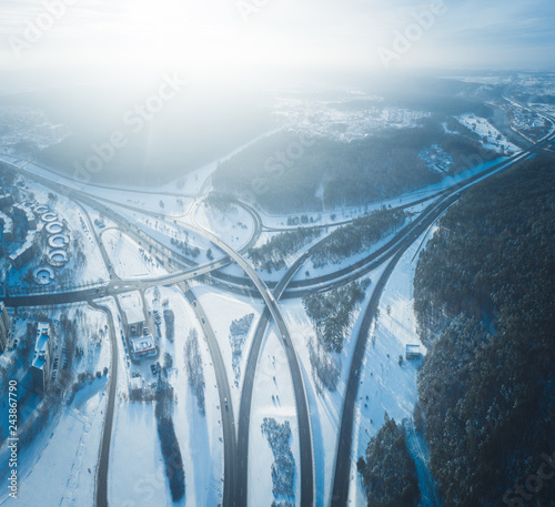 Frozen winter highway junction intersection, aerial panorama
