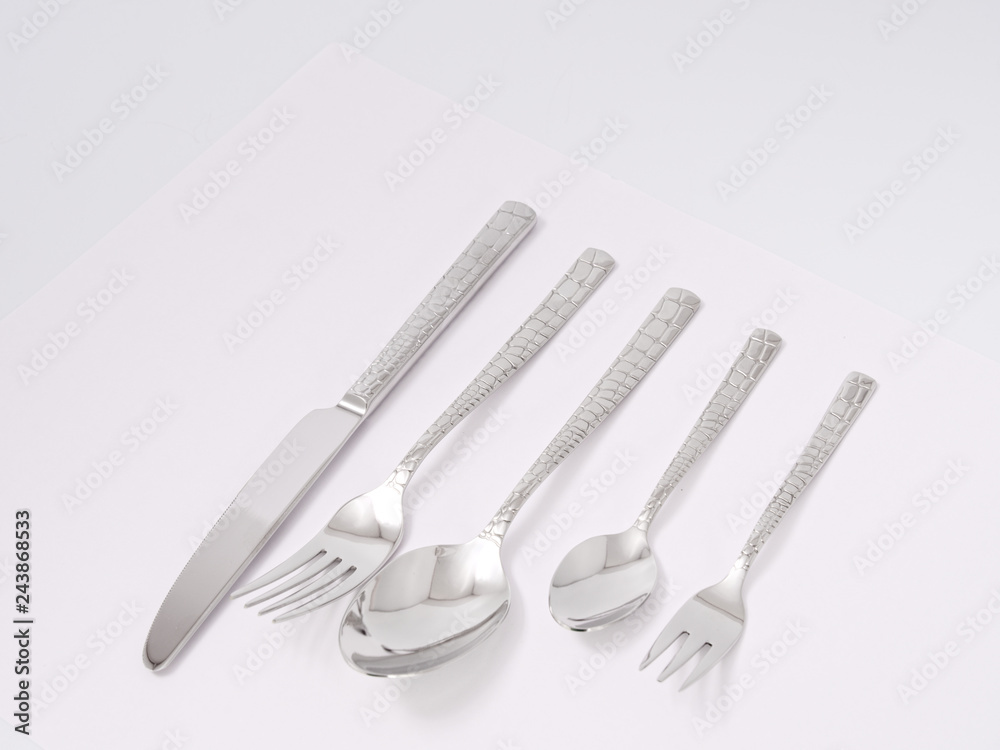 silverware forks spoons knives cutlery on a white background silverware forks spoons knives cutlery on a white background