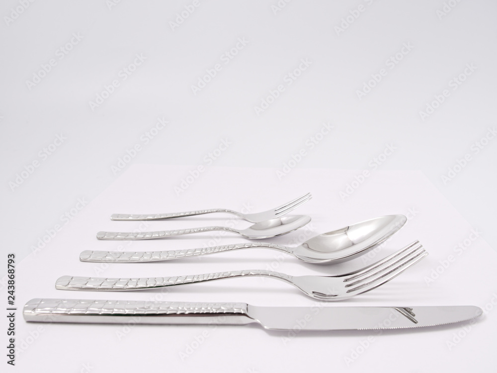 silverware forks spoons knives cutlery on a white background silverware forks spoons knives cutlery on a white background