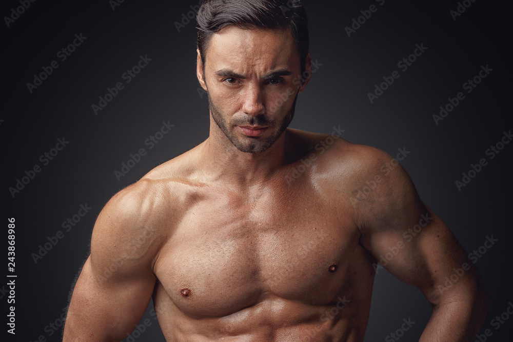 Young athletic male in underwear posing on camera. Young athletic male in underwear posing on camera.