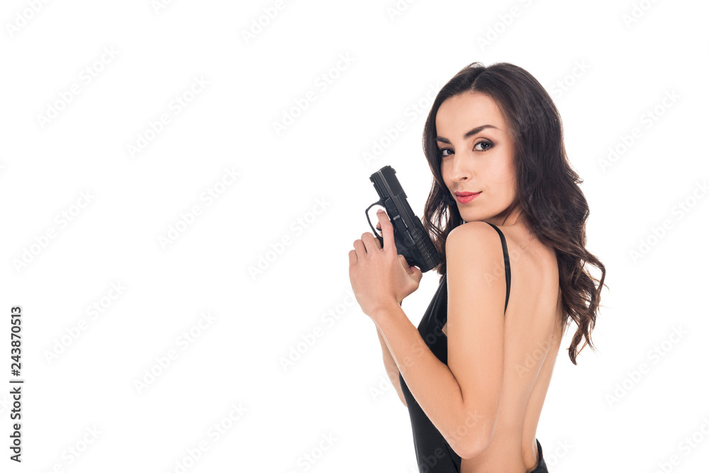 attractive female killer in black dress holding gun, isolated on white attractive female killer in black dress holding gun, isolated on white