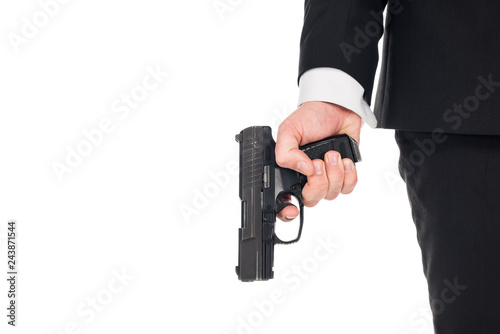 partial view of secret agent holding gun, isolated on white