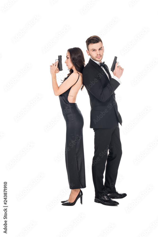 couple of secret agents posing with guns, isolated on white couple of secret agents posing with guns, isolated on white
