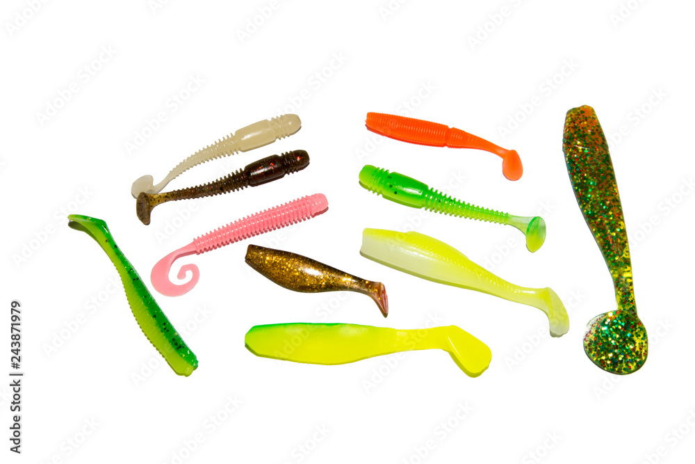 Silicone fishing lures. Lures for catching fish from edible rubber.  Colorful baits. Isolated on white background. Stock Photo