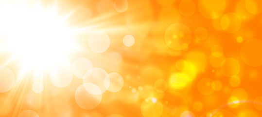 abstract orange background with sun and bokeh 