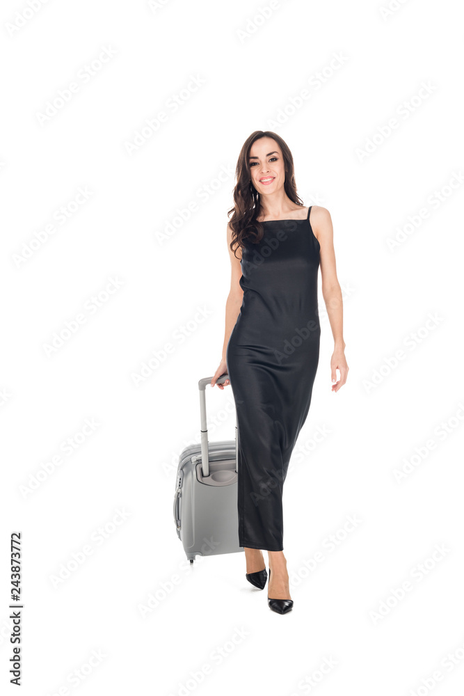 cheerful elegant woman in black dress walking with travel bag isolated on white cheerful elegant woman in black dress walking with travel bag isolated on white