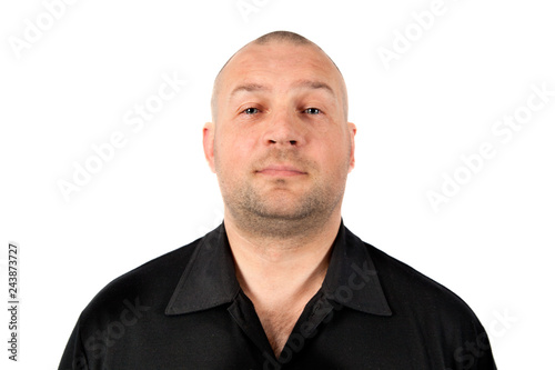 Portrait of a calm young man dressed in a black jacket