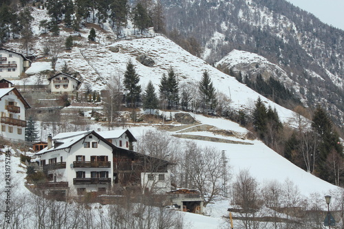 traditional wooden houses in the Alps mountains. Mountain landscape. Italian villages