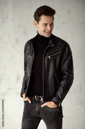 Young handsome man wear black leather jacket and turtleneck