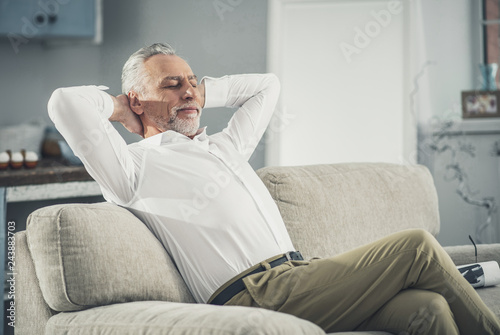 White collar worker feeling relaxed after coming back home
