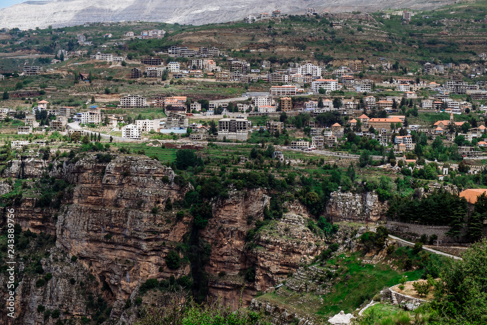 Faraya valley and village with scattered houses shot from the hill. Lebanon