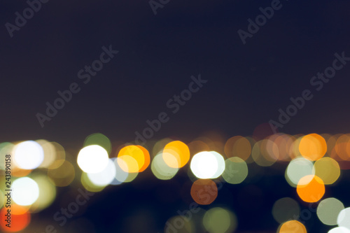 city night with dark sky, abstract blur bokeh light background © sutichak
