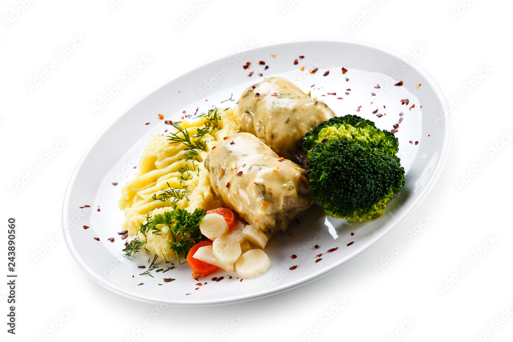 Roast meatballs with mashed potatoes and broccoli on white background Roast meatballs with mashed potatoes and broccoli on white background
