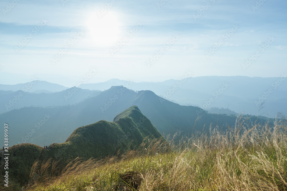 Obraz premium Landscape Mountain and tree at Khao Chang Puak at Thong Pha Phum National Park, Kanchanaburi, Thailand, Mountain view with clouds and blue sky.