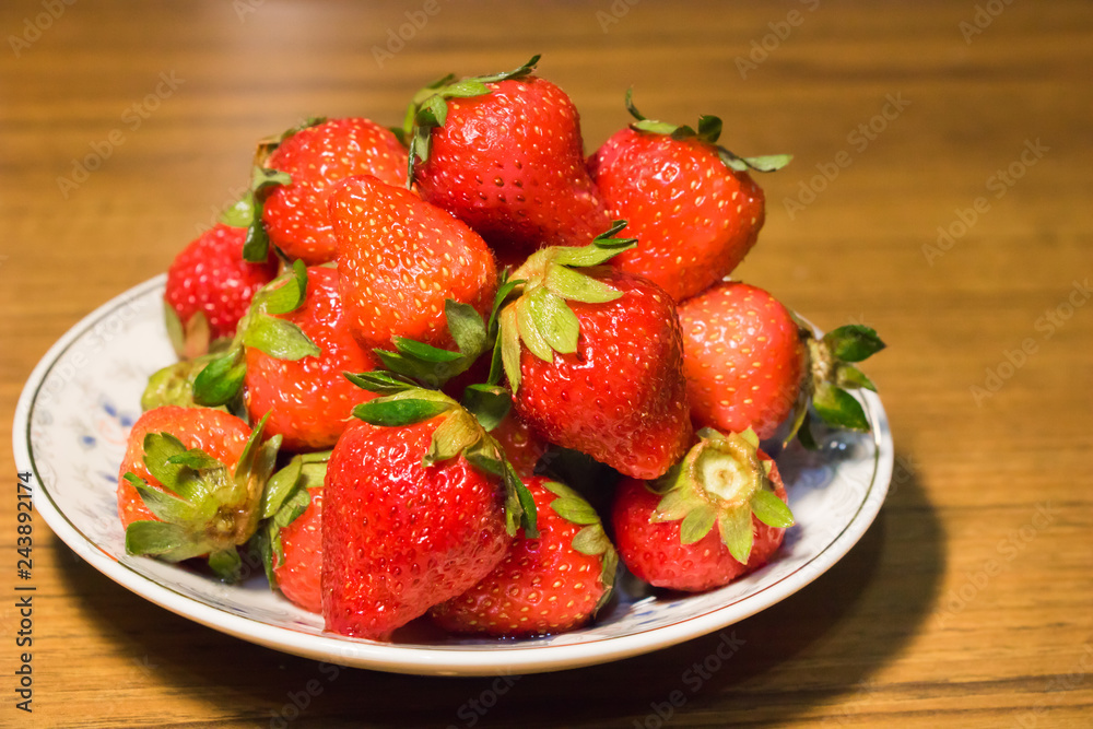 Strawberries in ceramic bowl. Fresh nice strawberries on wooden table. Juice strawberry - Image Strawberries in ceramic bowl. Fresh nice strawberries on wooden table. Juice strawberry - Image