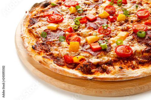 Pizza with ham and vegetables on white background