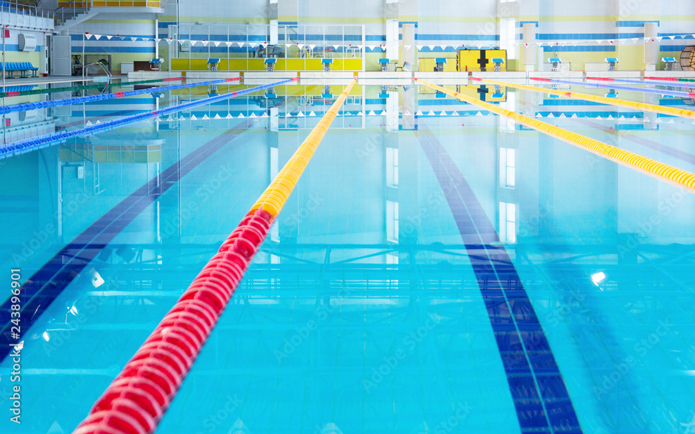 Row of starting blocks in a swimming pool